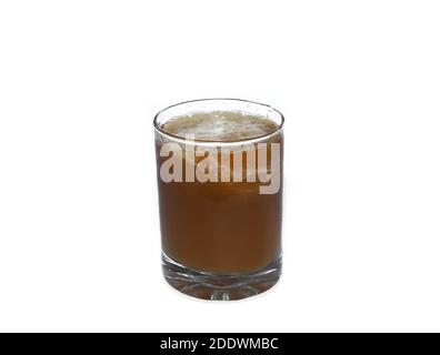 A glass of pomegranate fruits juice on white background. Stock Photo