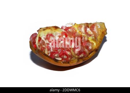 Ripe pomegranate fruits on the white backgrounds. Stock Photo