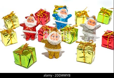 Santa Claus with Gift boxes on white backgrounds Stock Photo