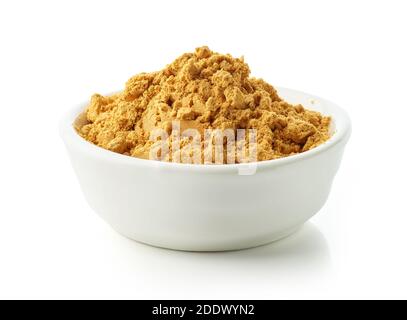 bowl of dried rose hip fruit powder isolated on white background Stock Photo