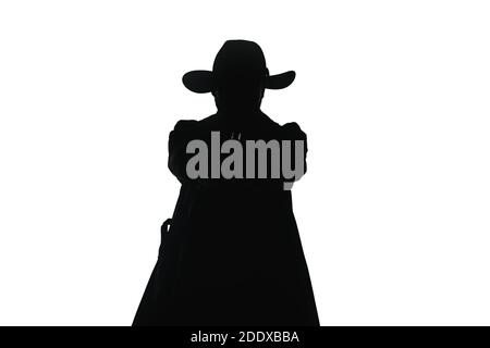 Portrait of a handsome stylish man posing in modern mafia hitman costume Stock Photo
