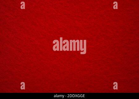 Felt background in red color useful for Christmas backgrounds. Hight quality photo Stock Photo