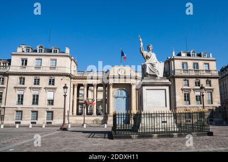 French National Assembly or Palais Bourbon (Bourbon Palace) back entrance on Rue de l'Universite (University Street) with Law statue in Paris, France. Stock Photo