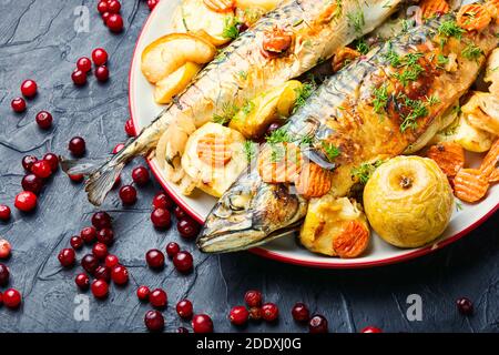 Delicious mackerel or scomber in apples and cranberry Stock Photo