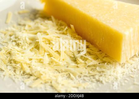 Grated Italian parmesan cheese prepared for cooking Stock Photo