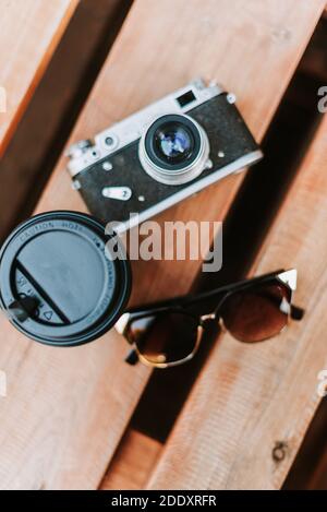Vintage camera on a wooden surface close-up Stock Photo