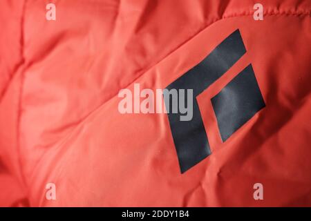 Zaragoza, Spain - October 21, 2021: Logo of the mountain sports brand, known as Black Diamond, screen printed on a rain jacket. Stock Photo
