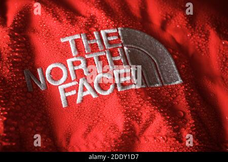 Zaragoza, Spain - October 21, 2021: Logo of the mountain sports brand, known as The North Face, sewn on a rain jacket. Stock Photo