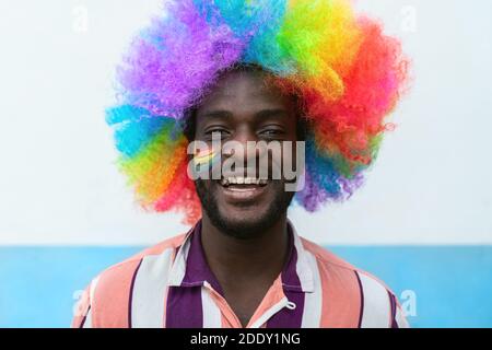 Happy African man having fun during gay pride festival day Stock Photo