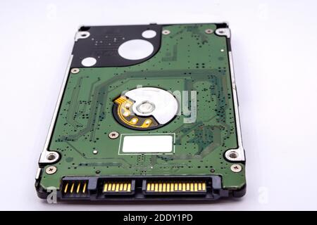 Close up of internal hard disk drive or hdd of Laptop isolated on white background. Stock Photo