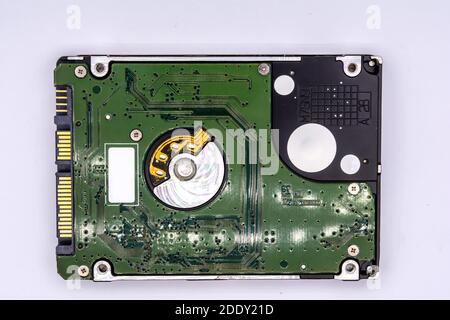Close up of internal hard disk drive or hdd of Laptop isolated on white background. Stock Photo