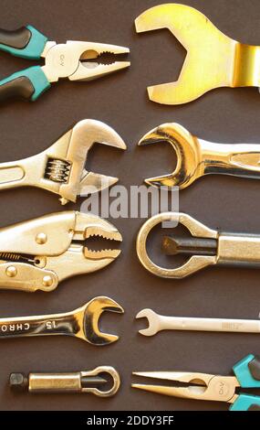 Variety of hand tools, including spanners, nut splitters, grips and pliers Stock Photo