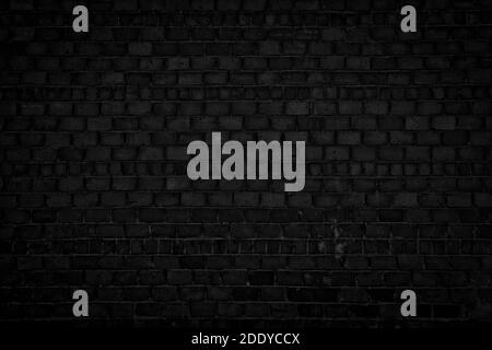 Black brick wall. Vintage dark background for creative design. Stock Photo