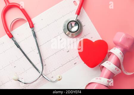 stethoscope and heart on a cardio diagram. Stock Photo