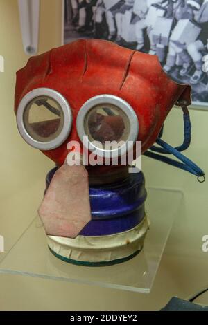 A 'Mickey Mouse' child's gas mask on display in the Thorpe Camp Visitor Centre, a WWII Royal Air Force barracks, Lincolnshire, UK. Stock Photo