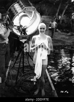 Olympics Swimmer ELEANOR HOLM on set candid in Swimsuit during filming of her only feature film TARZAN'S REVENGE 1938 director D. ROSS LEDERMAN based on a novel by Edgar Rice Burroughs Sol Lesser Productions / Twentieth Century Fox Stock Photo