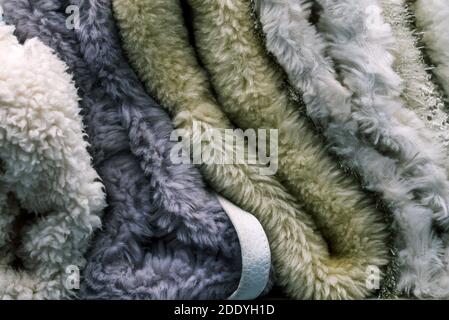 Wool fabric. A soft and warm blanket. Material for the production of clothing. Cloth samples close up. Textile background Stock Photo