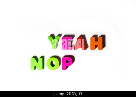 Colorful wooden letters with Yeah and Nope text at isolated background with shadows Stock Photo