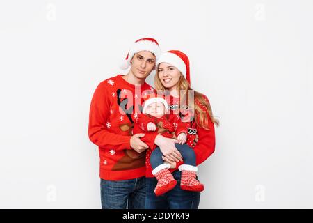 Mom dad and outlet baby matching christmas jumpers