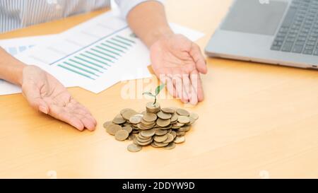 Tax concept. Man demonstrating scheme with icons Stock Photo - Alamy