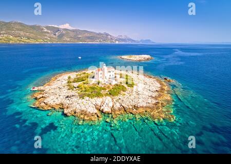 Aerial view of lonely island with lighthouse, Korcula riviera of Croatia, island Vela Sestrica Stock Photo
