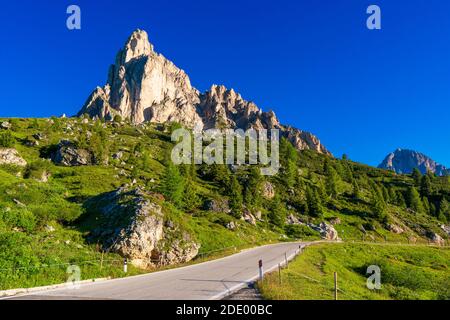 Giau Pass at daylight. Road to the mountain. Clear sky. Italy Stock Photo