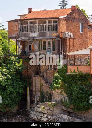 Abandoned brick building in lot with broken windows Stock Photo - Alamy