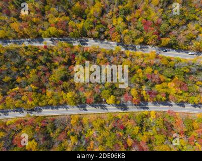 White Mountain National Forest fall foliage on Kancamagus Highway near Hancock Notch top view, Town of Lincoln, New Hampshire NH, USA. Stock Photo