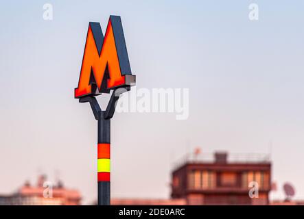 MOSCOW - NOW 16: Red letter M as logotype of Moscow metro in Moscow, November 16. 2020, Russia Stock Photo