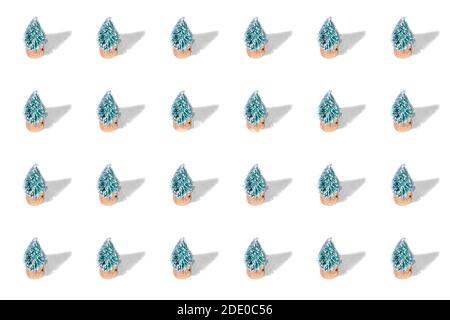 Christmas tree composition. White winter background with pine cone trees. Stock Photo