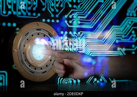 Cyber security concept. Fingerprint and safe as an idea to counteract hacking computers and smartphones or tablets as well as an idea for a network fi Stock Photo