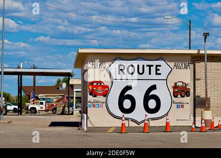Seligman, Arizona, USA - July 30, 2020: A large painting of a 'Route 66' sign welcomes visitors to the town of Seligman, located on Historic Route 66. Stock Photo