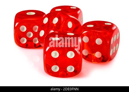 Red acrylic transparent dice for games. Five gambling translucent dices on white background, macro close up high resolution. Stock Photo