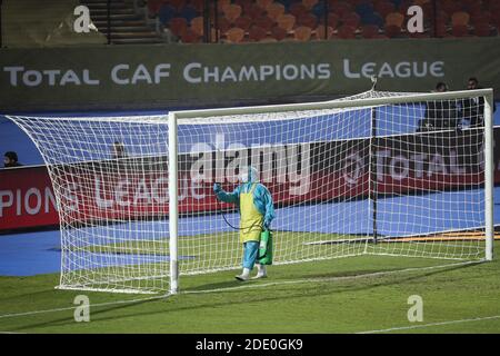 Cairo, Egypt. 27th Nov, 2020. A worker disinfects the goal frame before the African Champions League Final soccer match between Zamalek and Al Ahly at Cairo International Stadium. Credit: Omar Zoheiry/dpa/Alamy Live News Stock Photo