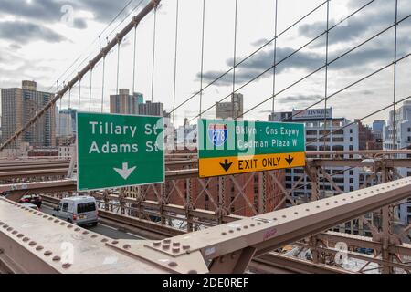 road signs on gantry above Brooklyn Bridge in New York City Stock Photo