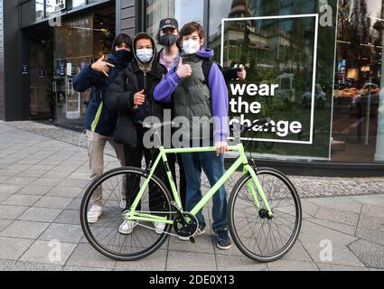 Berlin, Germany. 27th Nov, 2020. Boys wearing face masks pose for a photograph in Berlin, capital of Germany, on Nov. 27, 2020. Germany's COVID-19 caseload has topped 1 million after 22,806 new infections were reported within one day, the Robert Koch Institute (RKI) announced on Friday. Credit: Shan Yuqi/Xinhua/Alamy Live News Stock Photo