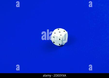 Dice macro photo on a plain monochrome background Stock Photo