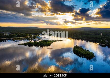 Clouds reflecting at sunset on Lake Inari, Inari, Lapland, northern Finland, Europe Stock Photo