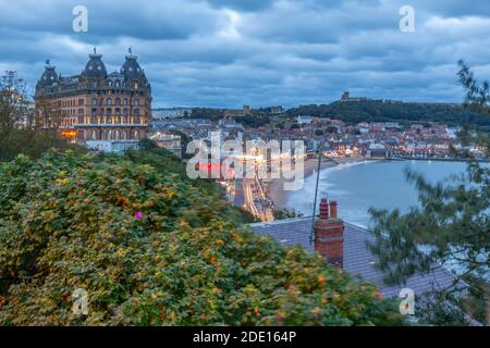 View of South Bay and Scarborough at dusk, Scarborough, North Yorkshire, Yorkshire, England, United Kingdom, Europe Stock Photo