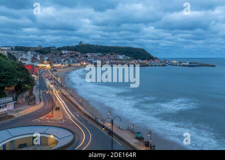 View of South Bay and Scarborough at dusk, Scarborough, North Yorkshire, Yorkshire, England, United Kingdom, Europe Stock Photo