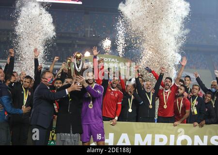 Cairo, Egypt. 27th Nov, 2020. Players of Egypt's Al Ahly celebrate during the trophy ceremony after the final match of the CAF Champions League in Cairo, Egypt, Nov. 27, 2020. Credit: Ahmed Gomaa/Xinhua/Alamy Live News Stock Photo