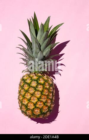 Fresh pineapple on yellow background Stock Photo