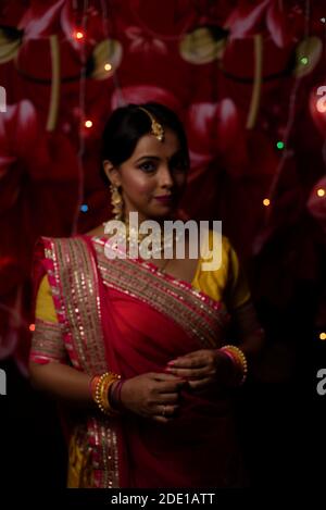 elegant black saree posed on restaurant 