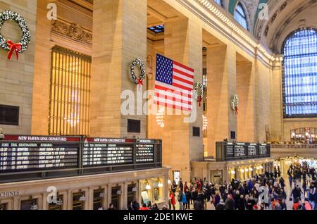 Crowded Grand Central Station Main  Concourse. Historic Train Station Building. Arrival and Departure Boards. Manhattan, New York City, USA Stock Photo