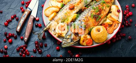 Delicious mackerel or scomber in apples and cranberry Stock Photo