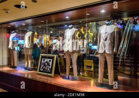 The Beatles Band Official Costumes Displayed in the Storefront of