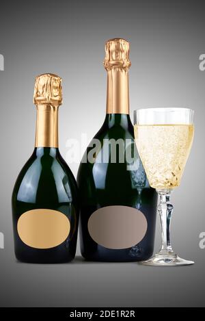Two different kind of Champagne Bottles and a filled glass. Isolated on white Stock Photo