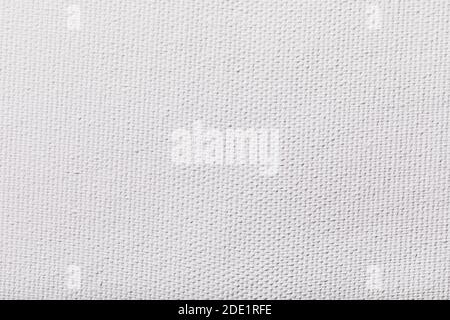The texture of a blank primed canvas for painting. Stock Photo