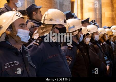 YEREVAN, ARMENIA - NOVEMBER 10: Armenian police stand guard in front the official residence of the Prime-Minister of Armenia during protest rally demanding resignation of Armenian Prime Minister Nikol Pashinyan who signed the statement ending hostilities in the disputed region of Nagorno-Karabakh and handing over a significant part of the territories in the region to Azerbaijan in the city of Yerevan capital of Armenia Stock Photo