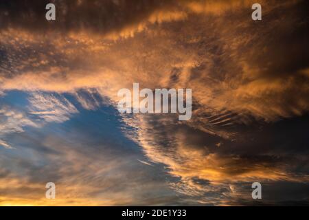 dramatic skies with sunlight and dark clouds Stock Photo